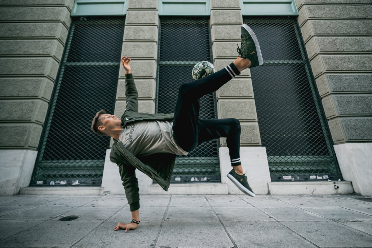 The Explore II Green Knit freestyle and street football shoes